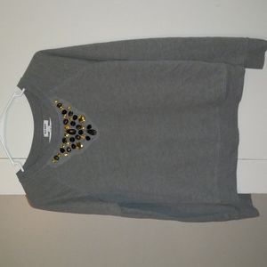 Dark grey sweater/shirt with gems in front
